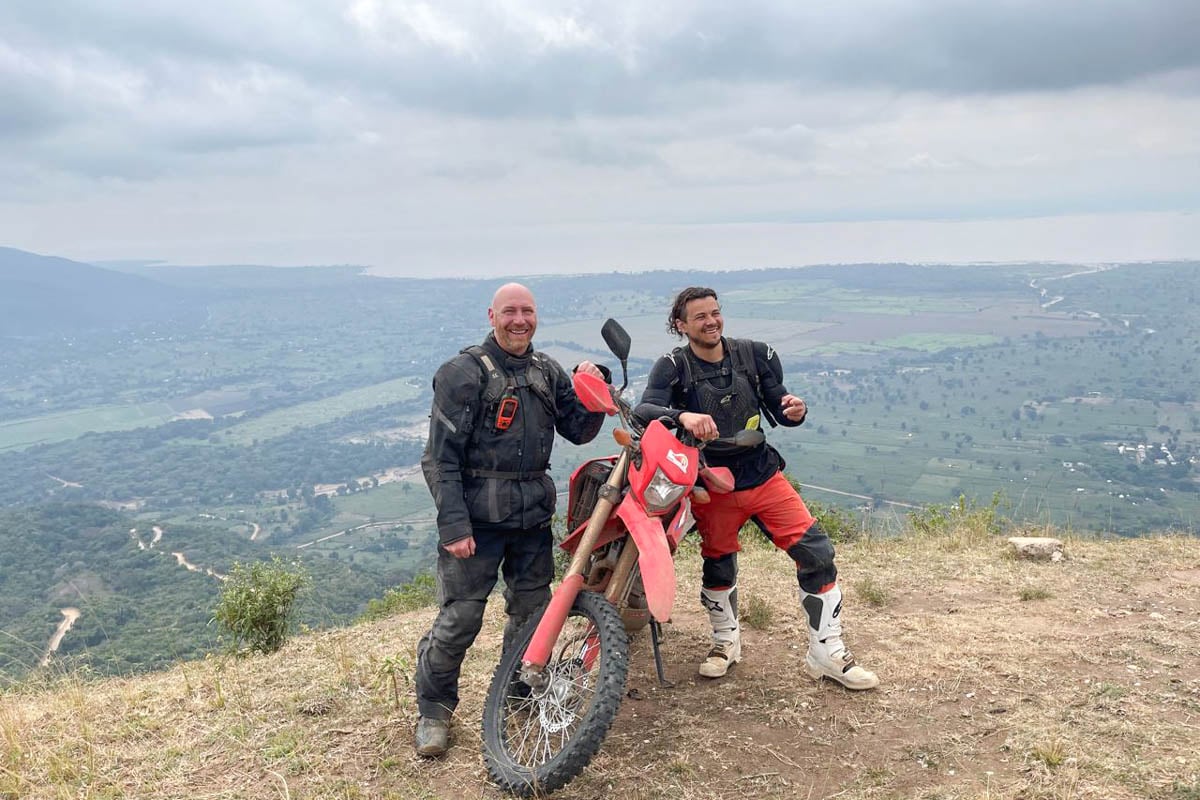 charlie-and-garrett-smiling-at-a-viewpoint-in-tanzania-africa-1