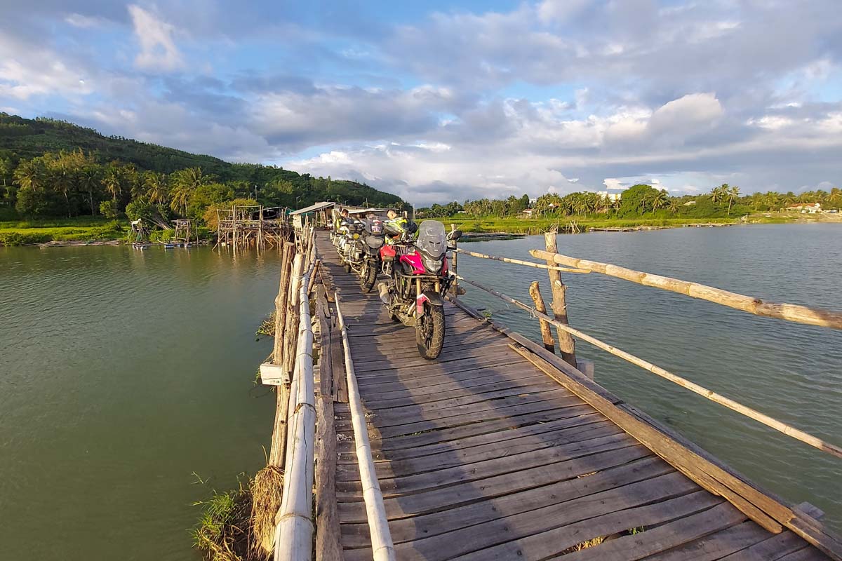 crossing-bamboo-bridge-by-motorbike-vietnam