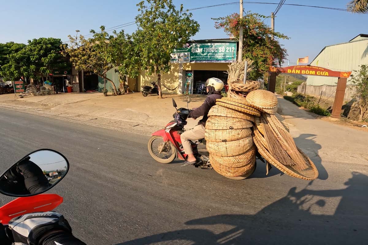 motorcycle-carrying-alot-of-baskets-vietnam