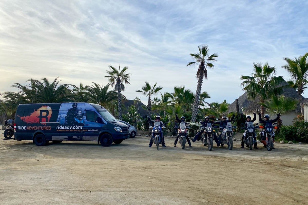 riders-cheering-with-ride-adventures-van-in-front-of-resort-baja-mexico