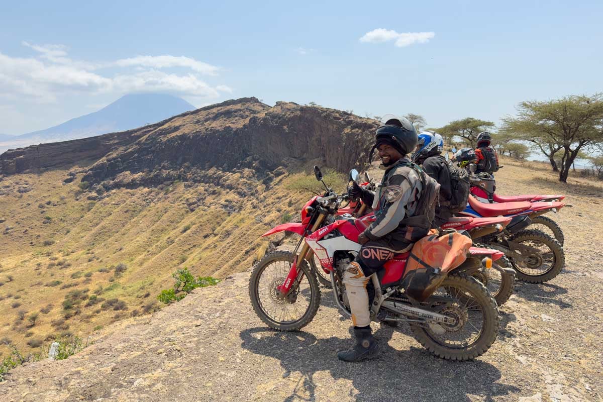 riders-on-motorcycle-safari-at-shimo-la-mungu-crater-tanzania-africa